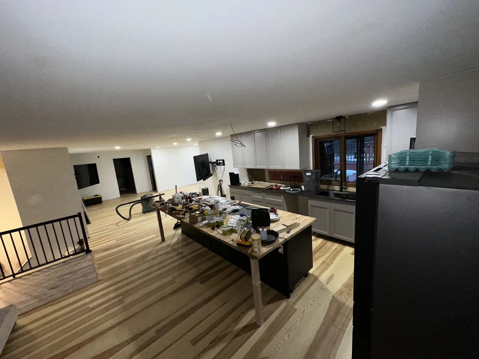 Kitchen with island and cabinetry during active finish work
